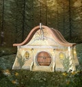 Fantasy enchanted house in a blooming forest