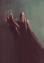 Fantasy hooded demon in the dark,  with reaching hand Royalty Free Stock Photo