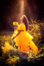 Fantasy magic fairy nymph in yellow dress Royalty Free Stock Photo