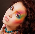 Fantasy. Multicolored Woman's Face. Vibrant Colorful Rainbow Makeup