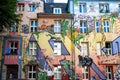 Fantasy painting on colorful house front, graffiti art on facade in hotspot of Dusseldorf, Germany