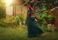 Fantasy portrait Ukrainian happy authentic woman walks in motion. Long brunette hair. Ribbon silk fabric flying in wind