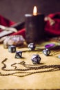 Fantasy role play board game still life concept. Selective focus on dice. Royalty Free Stock Photo