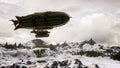 3D illustration of a fantasy steampunk airship flying over snow covered mountains with low grey clouds. Royalty Free Stock Photo