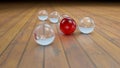 Fantasy transparent and colored realistic glass balls on a realistic wood floor floor.