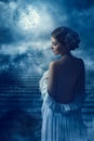 Fantasy Woman Back Rear View Portrait in Moon light, Fairy Mystic Girl in Night Royalty Free Stock Photo
