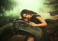 Fantasy woman evil dark queen witch hugs dragon, touching with hands head. Girl mistress tamed myth monster, concept of