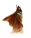 Fantasy young witch - beautiful woman with cloak and hood holding a magic staff