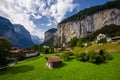 Faouse view of Lauterbrunnen town in Swiss Alps valley with gorgeous Staubbach waterfalls in, Switzerland Royalty Free Stock Photo