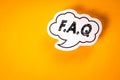 FAQ Frequently Asked Questions Concept. Speech bubble on yellow background