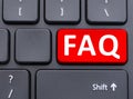 Faq red button on black keyboard concept Royalty Free Stock Photo