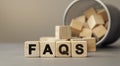 FAQS - word concept from wooden blocks on desk