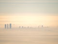 Far aerial view of Madrid city with fog in the morning