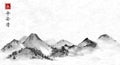 Far mountains hand drawn with ink on rice paper background. Traditional oriental ink painting sumi-e, u-sin, go-hua
