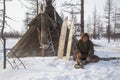 Far north of Yamal, tundra, pasture nord reindeers, closeup portrait of Nenets at age, close-up portrait of Nenets in national