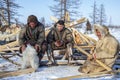 Far north of Yamal, tundra, pasture nord reindeers, family of reindeer herders of the north, father with two sons and a dog