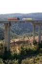 Far view of bridge with two lorries Royalty Free Stock Photo