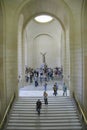 Far view of Nike of Samothrace, interior of the Louvre Museum, Paris, France