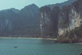 Faraway limestone rocks and tropical vegetation in Krabi, Thailand