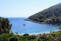 A faraway view from above of the beautiful beach of Pupnatska Luka, on Korcula Island, Croatia. Locals and tourists are swimming