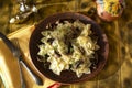 Farfalle pasta with champignon mushrooms and garlic creamy sauce onplate, top view Royalty Free Stock Photo