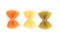 Farfalle pasta, isolated, three colors.