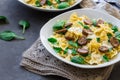 Farfalle pasta with mushrooms and spinach