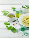 Farfalle pasta with pesto genovese basil sauce on white rusti Royalty Free Stock Photo