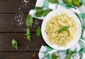 Farfalle pasta with pesto genovese & x28;basil sauce& x29; on rustic wood Royalty Free Stock Photo