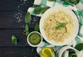 Farfalle pasta with pesto genovese & x28;basil sauce& x29; on rustic wood Royalty Free Stock Photo