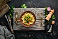 Farfalle pasta with vegetables on the plate. Royalty Free Stock Photo