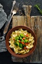 Farfalle pasta with vegetables on the plate. Royalty Free Stock Photo