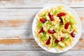 Farfalle Pasta warm salad with avocado slices and basil Royalty Free Stock Photo