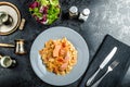 Farfalle with tomato sauce and roasted salmon Royalty Free Stock Photo