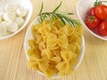 Farfalle, tomatoes and mozzarella balls Royalty Free Stock Photo