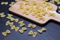 Farfelle on the cutting board Royalty Free Stock Photo