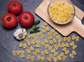Farfelle on the cutting board Royalty Free Stock Photo