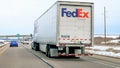 FARIBAULT, MN - 5 MAR 2023: Footage of Fed Ex Semi Truck Driving On Freeway