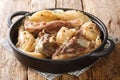 Farikal, or Lamb and Cabbage, is an old, traditional Norwegian dish closeup in a pan. Horizontal