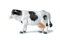 Farm animal. Beautiful toy white and black cow isolated on white background Royalty Free Stock Photo