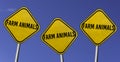 farm animals - three yellow signs with blue sky background