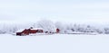 Farm barn and house surrounded by frosty trees Royalty Free Stock Photo