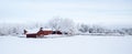 Farm barn and house surrounded by frosty trees Royalty Free Stock Photo