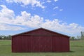 Farm barn red farming feed storage livestock shelter farmland sunny agricultural landscape