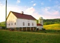 Farm Barn and Rolling Meadow at Sunset Royalty Free Stock Photo