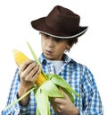 Farm Boy Husking Corn Royalty Free Stock Photo