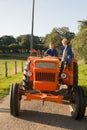 Farm Boys with tractor Royalty Free Stock Photo