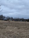 Farm Buildings and Silo on a Cloudy Fall Day Royalty Free Stock Photo