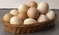 Farm chicken eggs. Lots of eggs in a wicker basket close up. Royalty Free Stock Photo