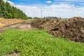 Farm composting in windrows Royalty Free Stock Photo